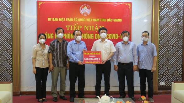 EVNNPC ủng hộ 1 tỉ đồng cùng Bắc Giang, Bắc Ninh phòng chống COVID-19 - Ảnh 1. EVNNPC ủng hộ 1 tỉ đồng cùng Bắc Giang, Bắc Ninh phòng chống COVID-19 - Ảnh 1.