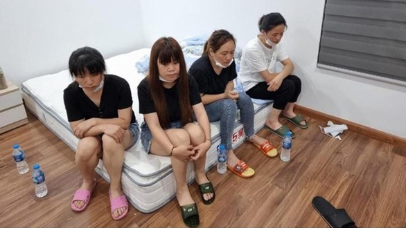 11 người Trung Quốc nhập cảnh trái phép đóng cửa cố thủ ở căn hộ chung cư tại Hà Nội - Ảnh 1. 11 người Trung Quốc nhập cảnh trái phép đóng cửa cố thủ ở căn hộ chung cư tại Hà Nội - Ảnh 1.