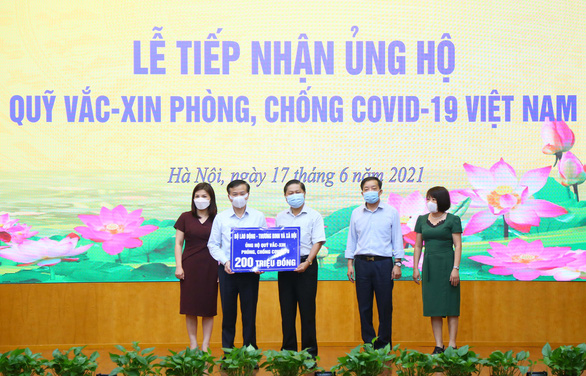 Quỹ vắc xin phòng, chống COVID-19 nhận thêm ủng hộ từ Bộ Lao động, thương binh và xã hội - Ảnh 1.