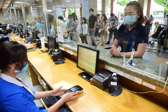 Vietcombank triển khai nhiều sản phẩm thúc đẩy thanh toán không dùng tiền mặt - Ảnh 2. Vietcombank triển khai nhiều sản phẩm thúc đẩy thanh toán không dùng tiền mặt - Ảnh 2.