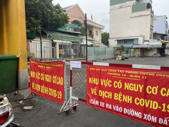 Đóng cửa chợ Bình Thới do có liên quan đến ca nhiễm COVID-19 - Ảnh 2. Đóng cửa chợ Bình Thới do có liên quan đến ca nhiễm COVID-19 - Ảnh 2.