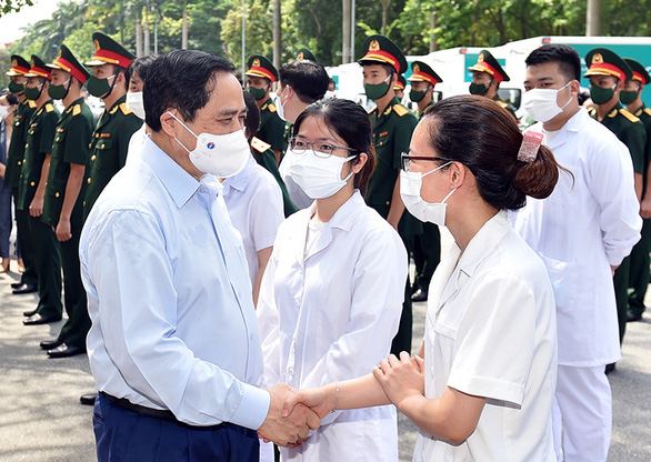 Cùng nhau quyết tâm thực hiện thành công chiến dịch tiêm chủng lớn nhất trong lịch sử - Ảnh 3.