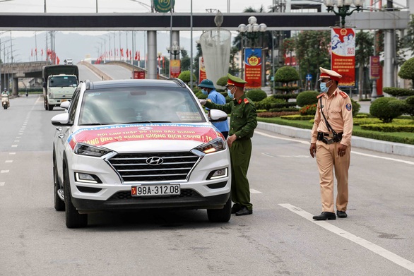 Dịch COVID-19 ngày 19-7: Người từ Hà Nội và tỉnh có dịch về Bắc Giang phải cách ly 14 ngày - Ảnh 1. Dịch COVID-19 ngày 19-7: Người từ Hà Nội và tỉnh có dịch về Bắc Giang phải cách ly 14 ngày - Ảnh 1.