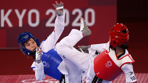 Cập nhật kết quả Olympic 2020: Kim Tuyền kiếm suất vào trận tranh HCĐ lúc 17h - Ảnh 3. Cập nhật kết quả Olympic 2020: Kim Tuyền kiếm suất vào trận tranh HCĐ lúc 17h - Ảnh 3.