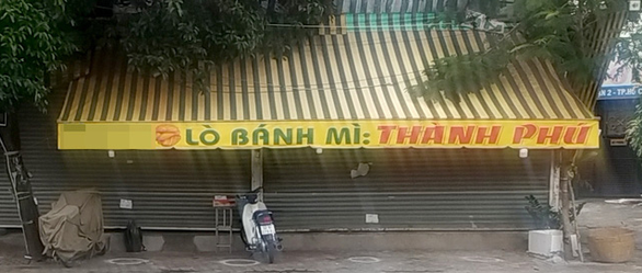 Lò bánh mì được hoạt động sau khi các thợ làm bánh xét nghiệp đều âm tính - Ảnh 1.