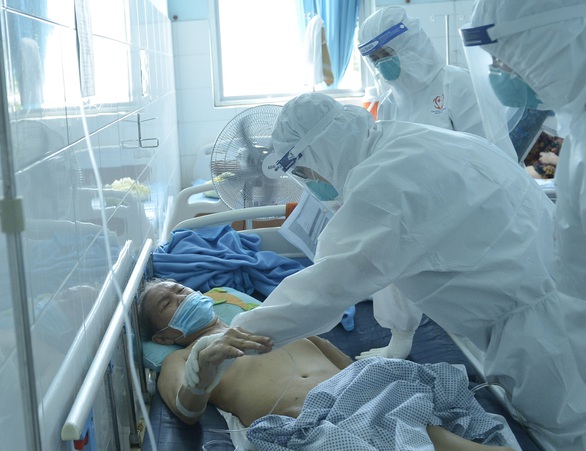 HĐND TP.HCM thông qua nghị quyết hỗ trợ lực lượng tuyến đầu chống dịch - Ảnh 1. HĐND TP.HCM thông qua nghị quyết hỗ trợ lực lượng tuyến đầu chống dịch - Ảnh 1.