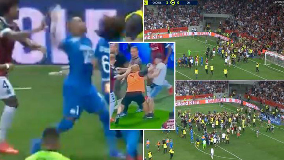 Trận Nice - Marseille bị hoãn ở phút 75 vì CĐV lao vào sân đánh nhau với cầu thủ - Ảnh 3.