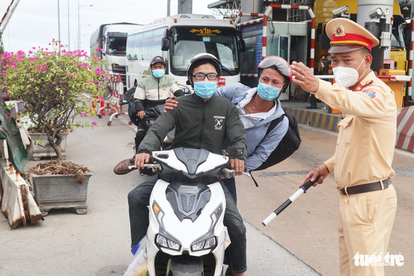 Dịch COVID-19 ngày 4-8: Nghệ An phát hiện nhiều ca COVID-19 là công dân đi xe máy về quê - Ảnh 1.