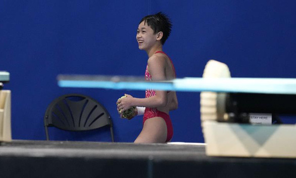 VĐV Trung Quốc 14 tuổi nỗ lực giành huy chương vàng Olympic để cứu mẹ - Ảnh 1.