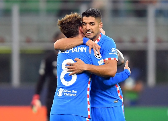 Suarez và Griezmann giúp Atletico Madrid thắng ngược AC Milan - Ảnh 2. Suarez và Griezmann giúp Atletico Madrid thắng ngược AC Milan - Ảnh 2.