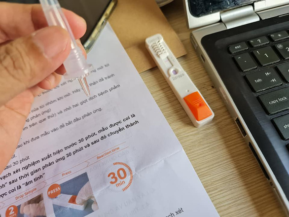 HỎI - ĐÁP về COVID-19: Tự xét nghiệm test nhanh ở nhà ra sao, cần lưu ý gì? - Ảnh 1.