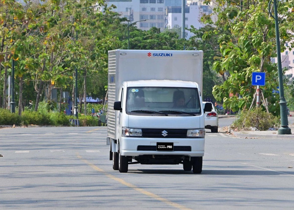Xe tải nhẹ Suzuki Carry cùng Acecook Sẻ chia hương vị yêu thương - Ảnh 4.