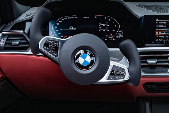 BMW muốn thiết kế lại vô lăng chỉ còn 2 tay cầm - Ảnh 1.