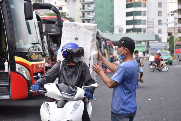 Tết này khác hẳn những xuân qua - Ảnh 1.