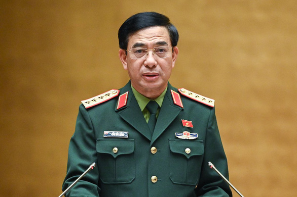 Đại tướng Phan Văn Giang trình Quốc hội dự án Luật phòng thủ dân sự - Ảnh 1.