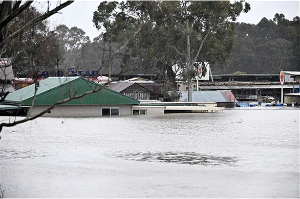 Chính phủ Úc triển khai chương trình mua lại nhà dân tại các vùng bị lũ lụt - Ảnh 1.
