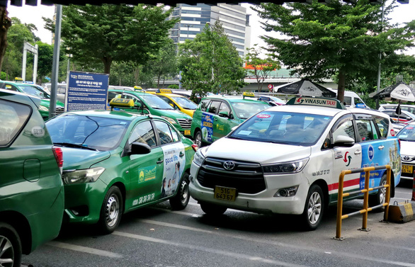 Đau đầu với taxi trá hình chặt chém khách - Ảnh 3.