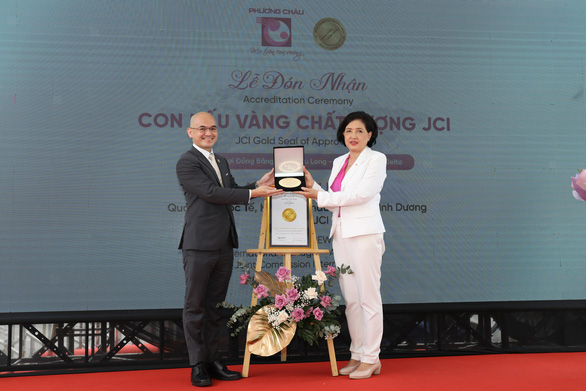 Bệnh viện Quốc tế Phương Châu đón nhận con dấu vàng chất lượng JCI - Ảnh 1.