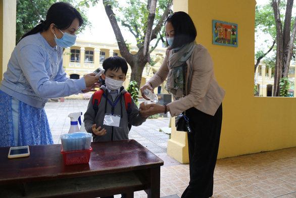 Tin sáng 16-2: 28 phường xã TP.HCM bị nâng cấp độ dịch vì chưa phủ đủ vắc xin - Ảnh 4.