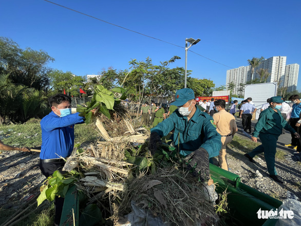 Quận 7 đã khơi thông hàng chục kênh rạch giúp giảm ngập - Ảnh 1.