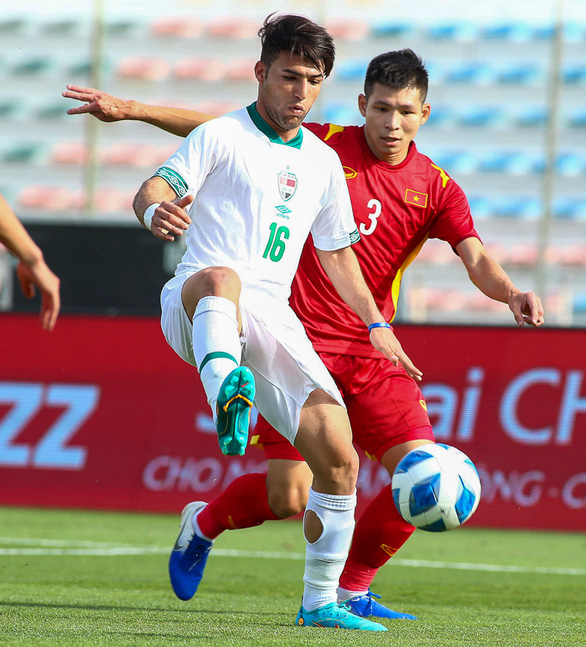 Trung vệ Liễu Quang Vinh chia tay SEA Games 31 - Ảnh 1.