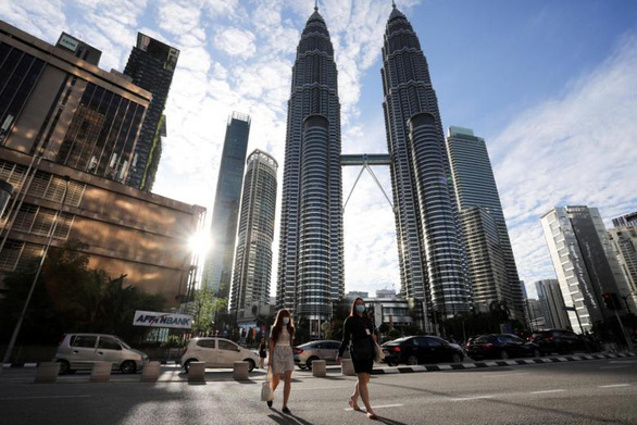 Malaysia mở cửa cho du khách quốc tế từ 1-4, không cần cách ly - Ảnh 1.
