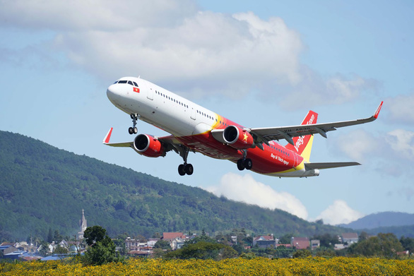 Vietjet báo lãi năm 2021, vận chuyển hơn 110 triệu lượt hành khách từ khi cất cánh - Ảnh 1.