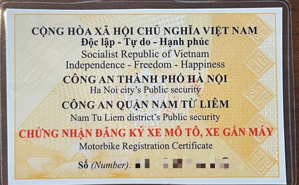 Không cần đến công an tỉnh, huyện, người dân có thể đến công an xã để đăng ký, bấm biển số xe máy - Ảnh 1.