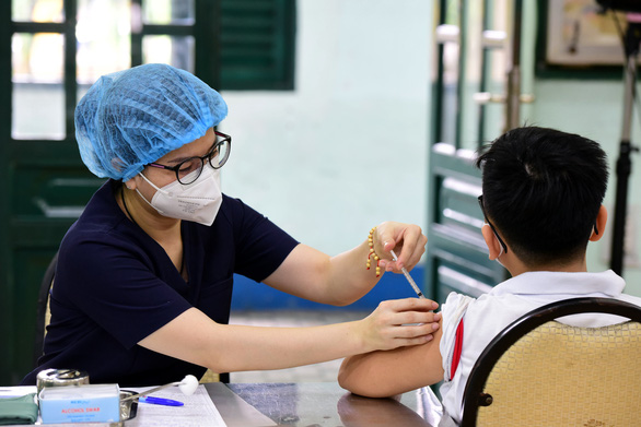 TP.HCM tiêm vắc xin cho trẻ 5 - dưới 12 tuổi: An toàn, chu đáo nhất cho trẻ - Ảnh 1.