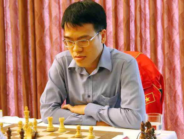 Đánh bại Foreest, Quang Liêm qua mặt ‘vua cờ’ Magnus Carlsen - Ảnh 1.