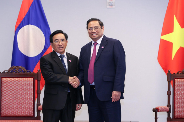 Thủ tướng Phạm Minh Chính gặp Thủ tướng Lào ở Mỹ, nói về quan hệ vững chắc hai nước - Ảnh 1.