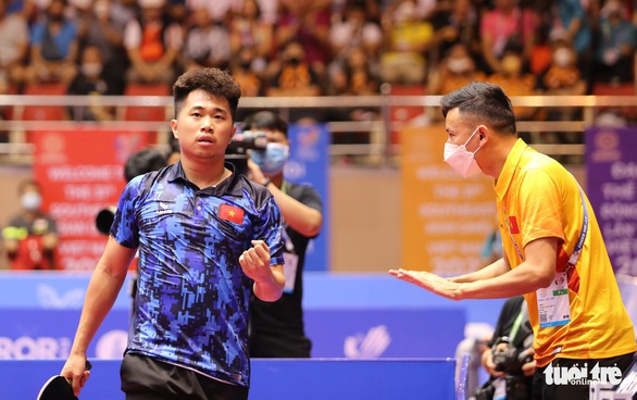 Huy chương vàng đơn nam sau 19 năm: Hai thế hệ bóng bàn đồng đội của nhà vô địch một thời - Ảnh 1. Huy chương vàng đơn nam sau 19 năm: Hai thế hệ bóng bàn đồng đội của nhà vô địch một thời - Ảnh 1.