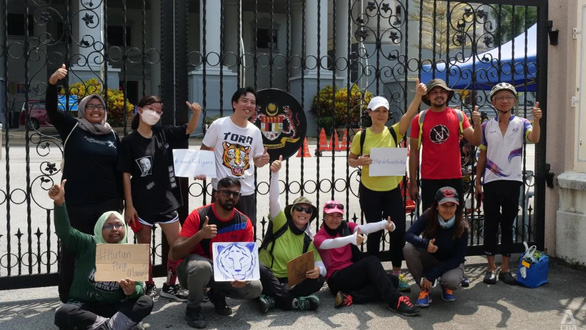 Malaysians walk 235km to call for the protection of the endangered Malayan tiger - Photo 1.