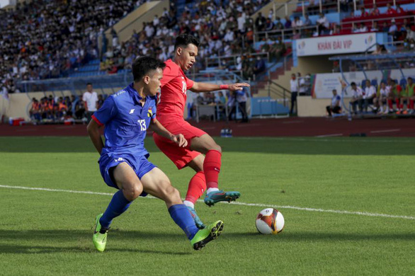 Dẫn trước Singapore 2-0 đến phút 88, Lào để mất điểm đáng tiếc - Ảnh 1.