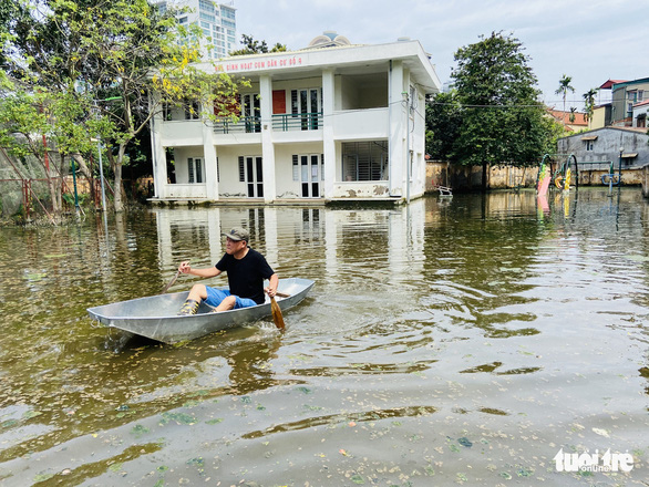 Mưa gây ngập lụt nghiêm trọng nhưng Hà Nội chỉ báo cáo sơ sài - Ảnh 1.