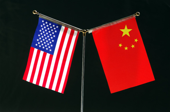 Mỹ muốn thêm công ty Trung Quốc vào danh sách đen, Bắc Kinh phản ứng - Ảnh 1.