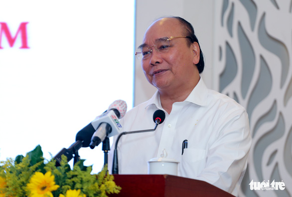Chủ tịch nước Nguyễn Xuân Phúc: Báo chí phải cảnh báo sớm để cơ quan, tổ chức không dám làm sai - Ảnh 2.
