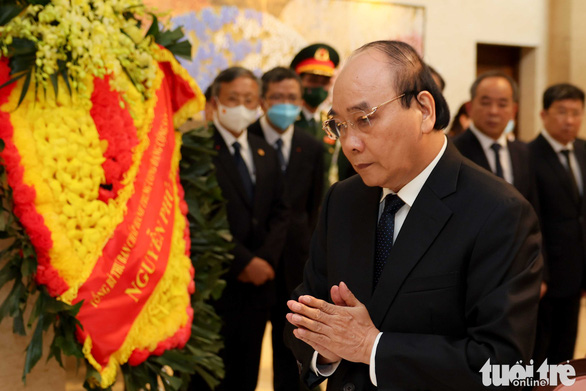 Chủ tịch nước Nguyễn Xuân Phúc đi máy bay thương mại dự quốc tang ông Abe Shinzo - Ảnh 1.
