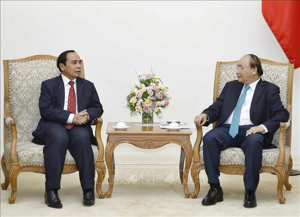 Phó chủ tịch nước Lào thăm Việt Nam - Ảnh 1.