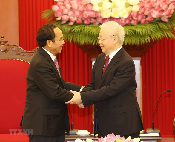 Tổng bí thư: Việt Nam ủng hộ mạnh mẽ công cuộc đổi mới của Lào - Ảnh 1.