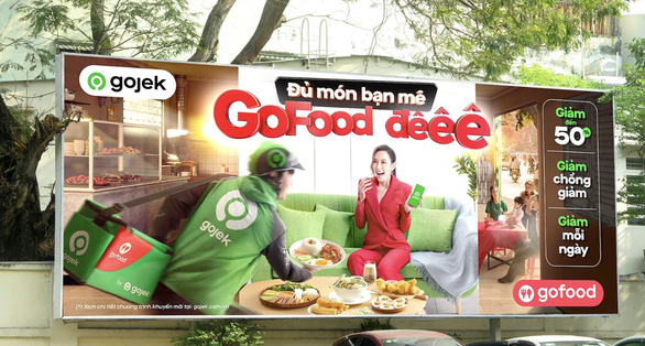 Độc đáo biển quảng cáo tĩnh ngoài trời phát ra tiếng rao của Gojek - Ảnh 1.