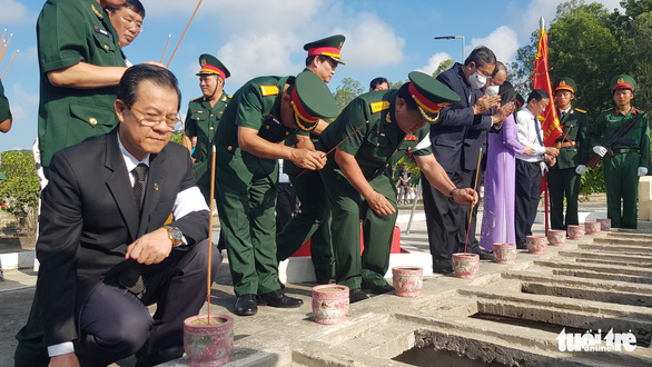 Lễ cải táng 68 hài cốt liệt sĩ quân tình nguyện Việt Nam trở về đất mẹ - Ảnh 2.