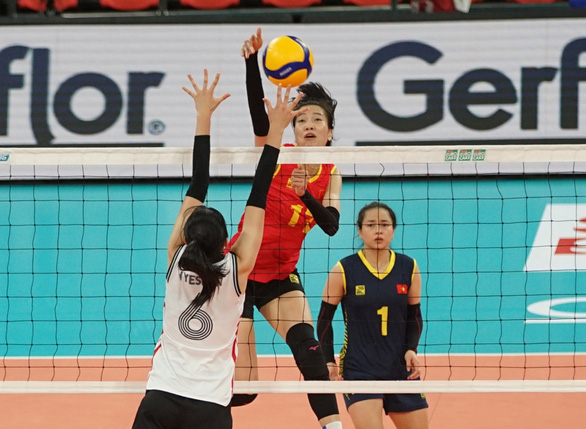 Bóng chuyền nữ Việt Nam đánh bại Hàn Quốc ở giải châu Á - Ảnh 2.