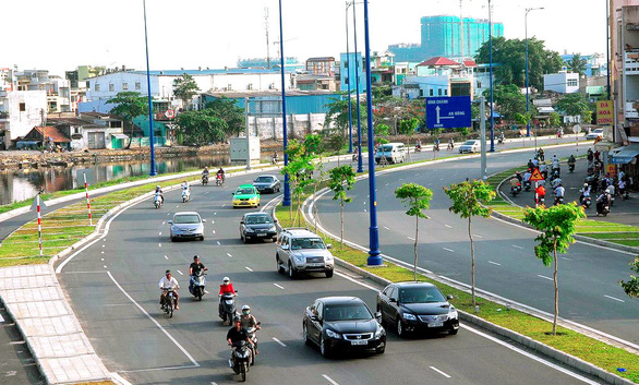 Quận Bình Tân phát triển nhờ đại lộ Võ Văn Kiệt - Ảnh 1.