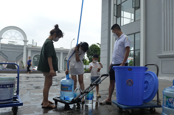 Vì sao nhiều nơi ở Hà Nội vẫn chưa có nước dù Nhà máy nước sạch Sông Đà đã hoạt động trở lại? - Ảnh 1.