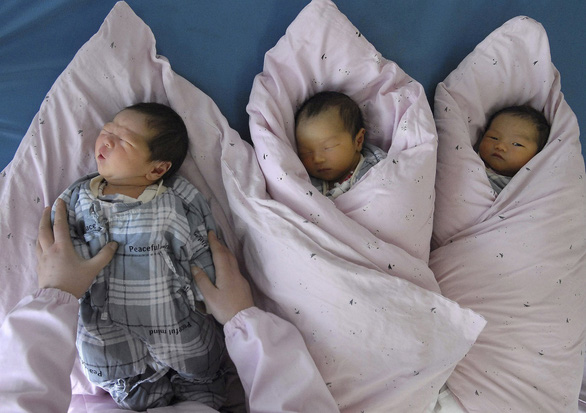 Tỉnh đầu tiên của Trung Quốc xóa bỏ hạn chế sinh đẻ - Ảnh 1.