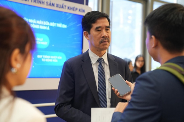 Ông Nguyễn Quốc Khánh - giám đốc điều hành Công ty cổ phần sữa Việt Nam - chia sẻ về các bước tiến mới trong việc chinh phục chuẩn quốc tế