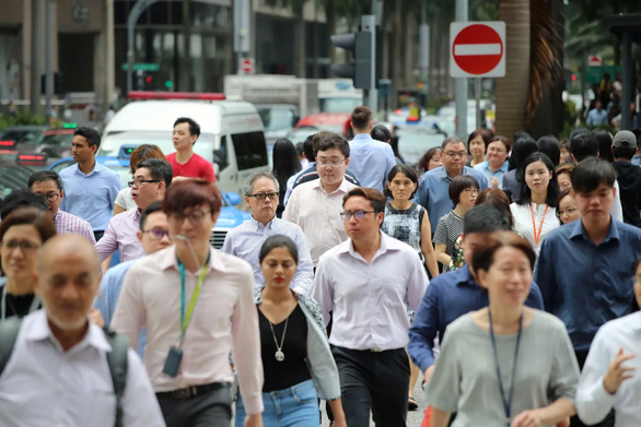 Nhân viên văn phòng tại khu thương mại trung tâm của Singapore. Ảnh minh họa. Nguồn: adriantan.com.sg