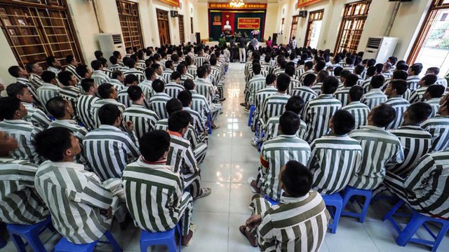 Phí mai táng phạm nhân chết trong tù: sao phải quy ra gạo? - Ảnh 1. Phí mai táng phạm nhân chết trong tù: sao phải quy ra gạo? - Ảnh 1.