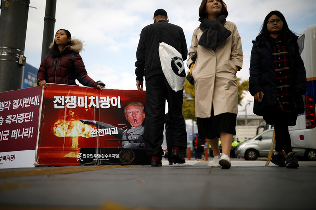 Hai thái cực ở Hàn Quốc trước ngày ông Trump đến - Ảnh 2.